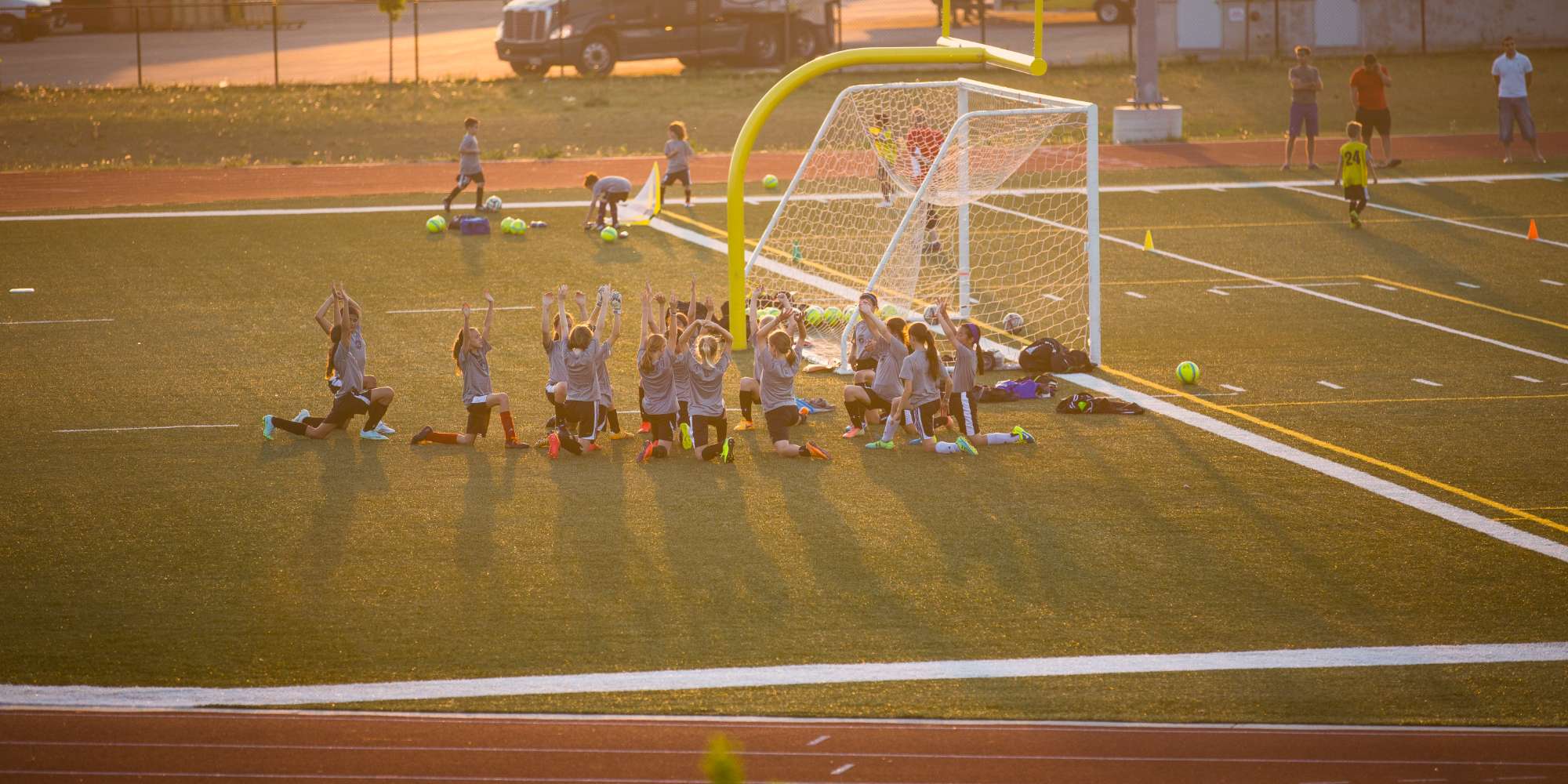 Soccer field with players in Erin Mills neighbourhood Mississauga