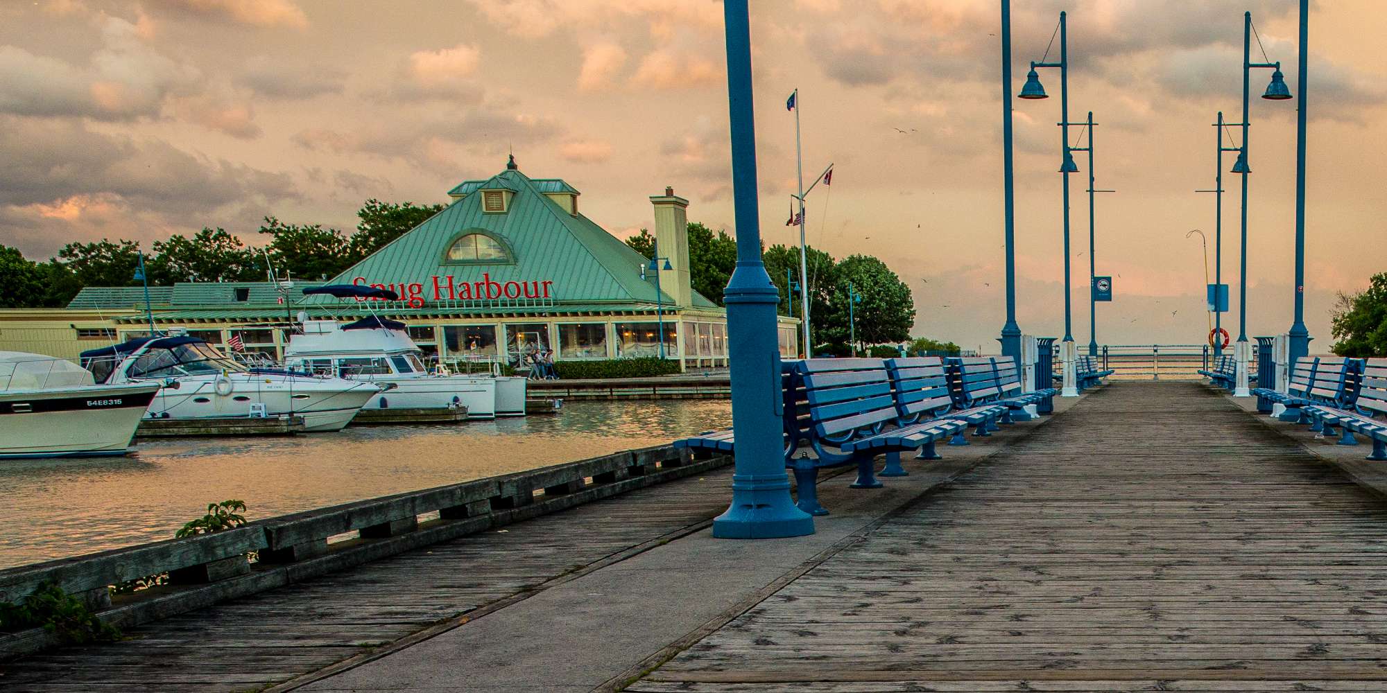 Waterfront boardwalk and pier along Lake Ontario in Port Credit Mississauga