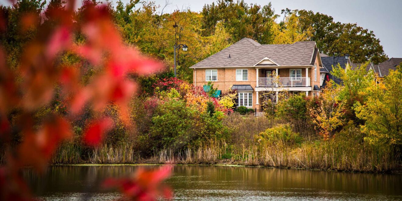 Detached homes along a tree lined street in Beaty Milton Ontario
