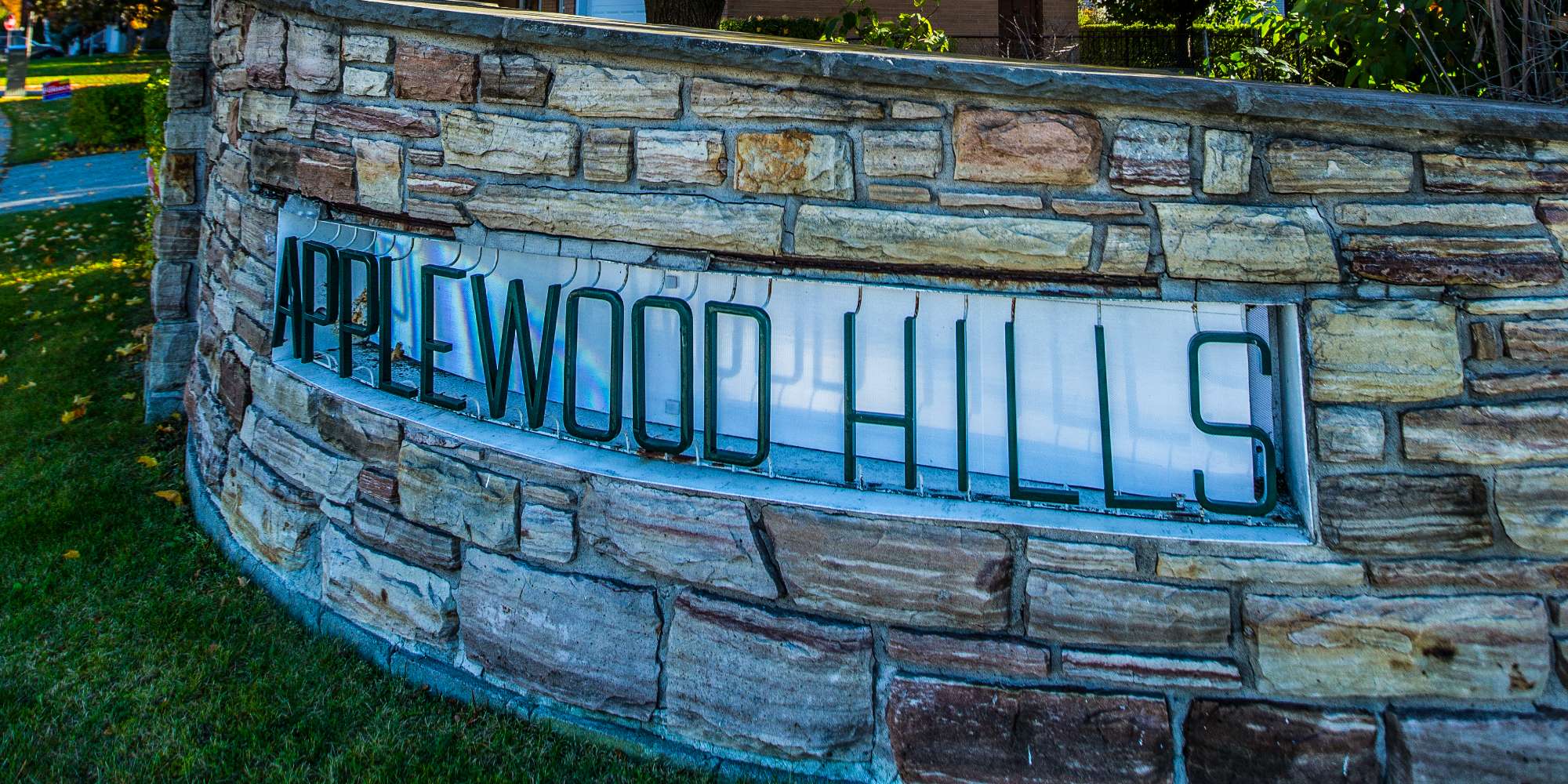 Park bench and green space in Applewood neighbourhood Mississauga